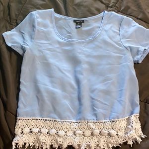 Sheer blue shirt with lace detail